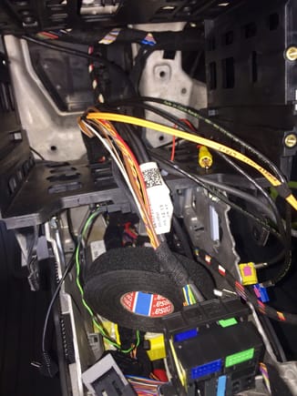 Disconnect Fiber Optic Cables/relocate and retake harness. Use Tesa Tape.