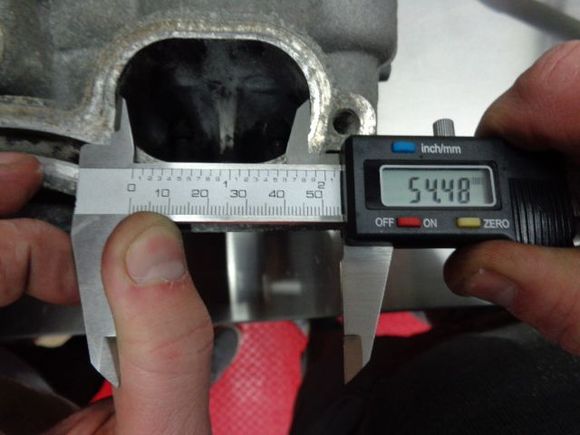 Exhaust port. The X51 size is the same as the regular port size, even though the header diameter is larger.
