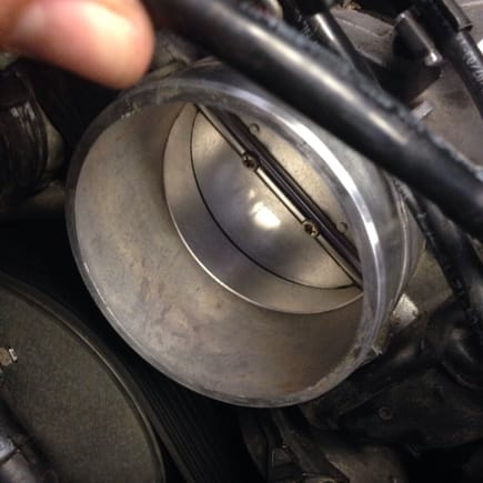 Clean throttle body.  Did not impact driving.  Still have idle dip.  Do not recommend bothering to do this.