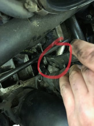 2. Remove bank 1 connector tube with a 21mm wrench