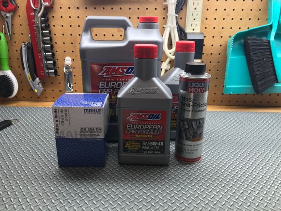 This AMSOIL 5W-40 is Porsche A40 approved.  For this change I added 500ml of the Liqui Moly additive.