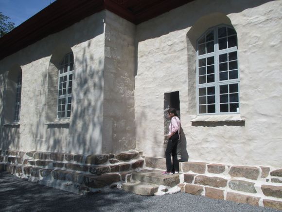 The narrow door where the clergyman entered the church.