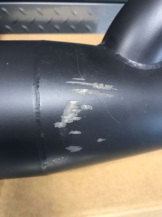 cosmetic damage on back side of pipes