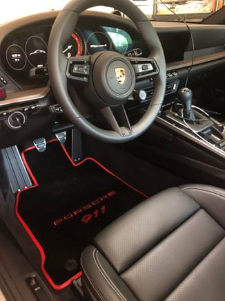I will get better pictures soon of interior but I like the mats with the guards red seat belts, chrono and speedometer.