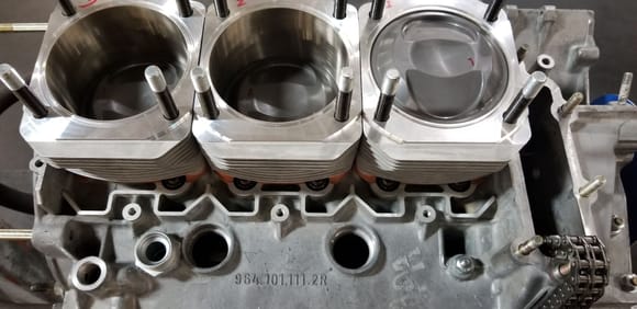 Cylinders and pistons being installed