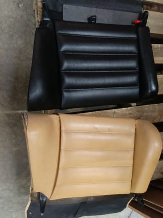 The tan turbo seat inner bolster is particularly more pronounced than the black standard seat bolster.  