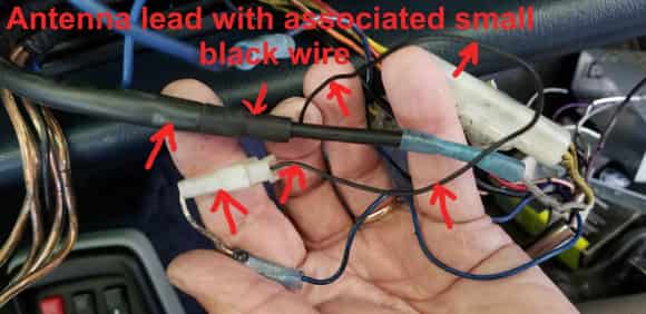 This is the small wire that is wrapped together with the antenna lead -- it was connected to the \"auto-antenna" lead on the prior Clarion stereo head. 
​​​​​​​