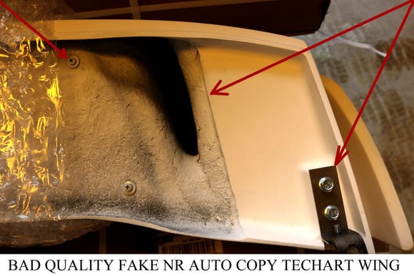 FAKE NR AUTO WING, YOU CAN SEE THE DIFFERENCE IN HARDWARE AND FINISH, NO PART NUMBERS ON THE WING OR ON THE HARDWARE.