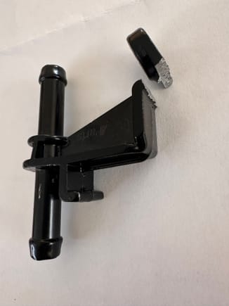 URO Part showing broken mounting tab.