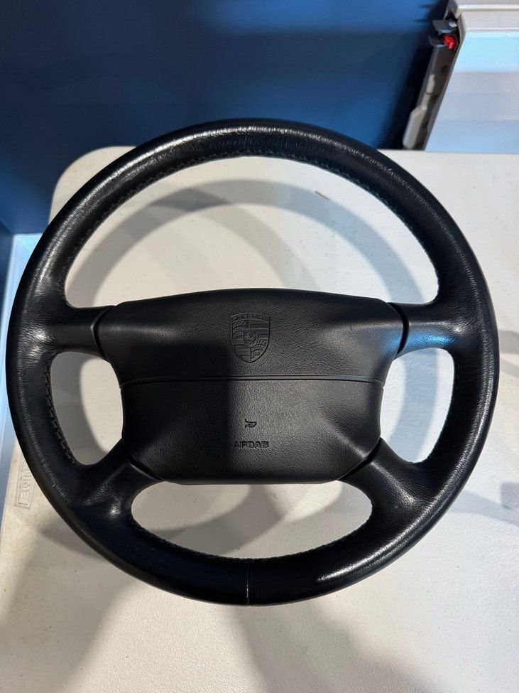 Steering/Suspension - 993 Used Black Leatherette 4-spoke steering wheel with OEM airbag - Used - 1995 to 1998 Porsche 911 - Northbrook, IL 60062, United States