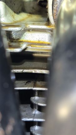 it starts to drip out of the top part of the picture where that hole is. after the engine runs for a few mins. 