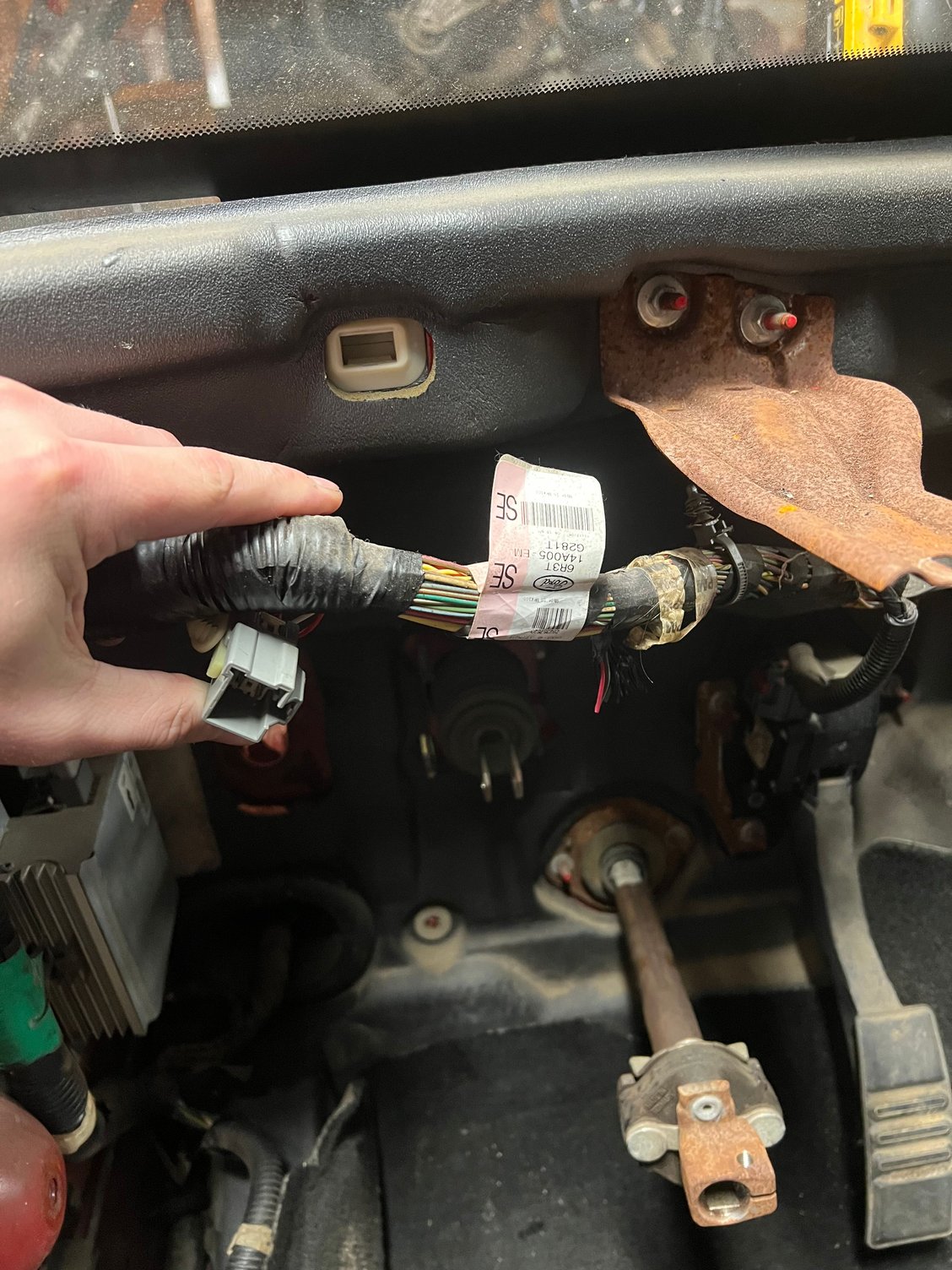 2006 harness. Connector I am referring to is above my thumb