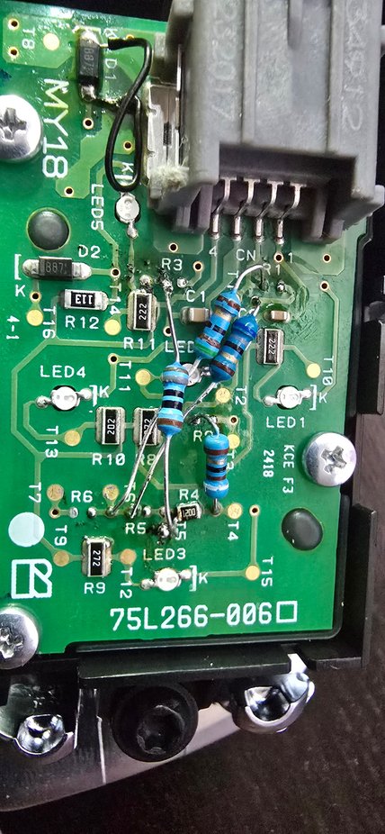 This is a working prototype for the audio buttons. All of them provide the correct resistance. In case you are wondering why there is a stray wire on the top, its because that diode actually prevents you from being about to read the resistance at the connector. The multimeter applies a small voltage to measure resistance and it is not enough to unlock the diode. So I use this wire to jump it.
