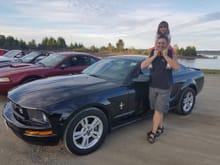 My daughter and I during a cruise with the "River City Stangs" located in Campbell River BC Canada. She named the car "Blackie" and she allows me to drive her to school in her car.