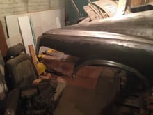 Picture of the rear quarter on the passenger side. This was a pretty typical place to rust on mustangs. The trunk drop-down panel is shot too