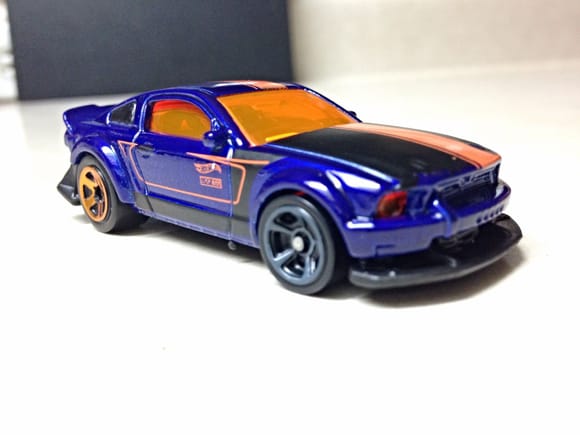I got this SEMA Mustang today. It may be odd. But, Hotwheels has added some nice casting features like the adjustable front chin spoiler so it can run on the loops and still look cool and normal without a funky looking swept up angle and the fact that the car has headlights and taillights cast in from the window piece.