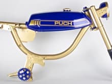 Transparent Gold and Emblem Blue Puch Magnum