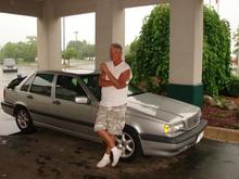 My friend Mike standing with my Volvo at the Comfort Inn Belleville.