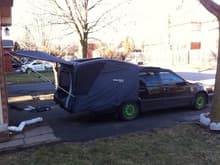 my volvo wagon with its tent set up and ready to go camping