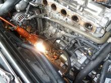 Front view of engine compartment after taking off the minimum of what I needed to remove in order to replace the PCV system.  Still was tight working when it came time to put the ETM back.  But workable...