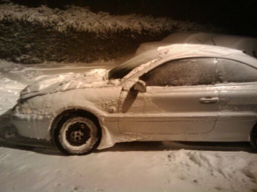 15" steelies, blizzak snow tires.