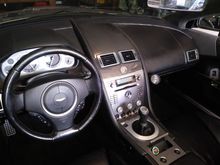Gauge on right, separate Voltmeter in Cigarette lighter...