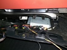 Both boxes under the glove box.  Its a very tight fit under there. I might move one box and attach it under the cover.