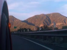 Screen grab from a video shot using a suction cup mount on the outside passenger door.  On Angeles Crest Highways in the Angeles National Forest.