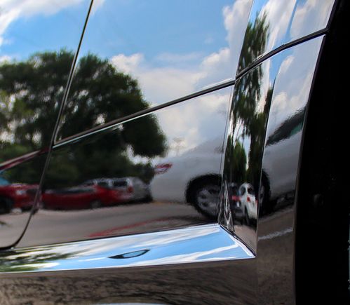 Here is an up close shot of the XPEL ULTIMATE covered rocker panel. To show that the film is virtually invisible, take a look at the unprotected body panel above the rocker.