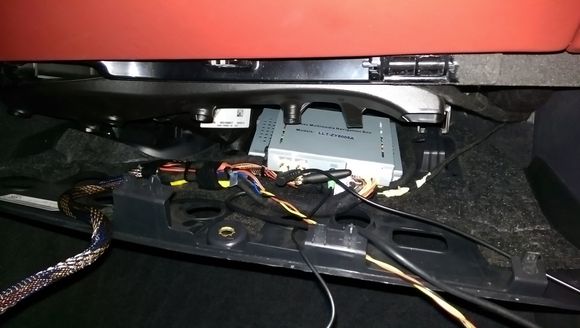 Both boxes under the glove box.  Its a very tight fit under there. I might move one box and attach it under the cover.