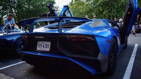 Stunning color on this Lamborghini Aventador SV at Katie's Cars And Coffee in Virginia. Photos taken by Mike Hermann.
