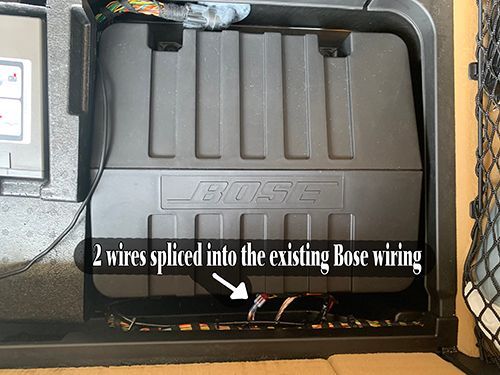 This is a view from the top of the existing Bose subwoofer.  Two wires were spliced into the existing wires at the sub.  Each of these wires were then split near to the LC2 so I had two negatives and two positives.  The LC2 had two negative inputs and two positive inputs.