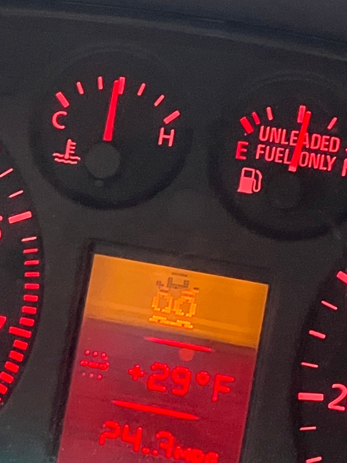  It kind of looks like a face, two big eyeballs, a hat and a flat grin!