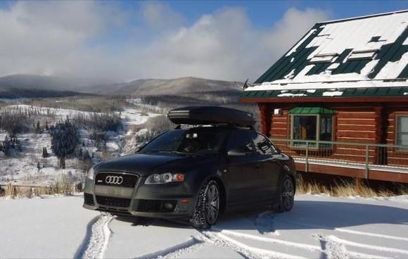Winter setup - full tint, 18" winter wheels, Dunlop winter tires, whispbar cross bars and rocketbox.  Our family 420hp Snowmobile.