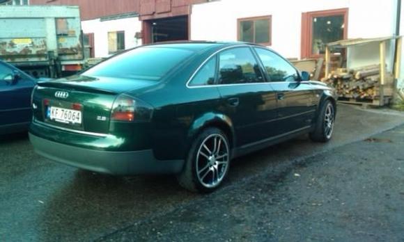 the black taillights matches the collour of the car perfect i think.