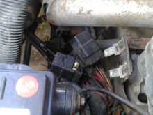 1985 v8.  What are these electrical things here ?? Looks like they got hot at some time 