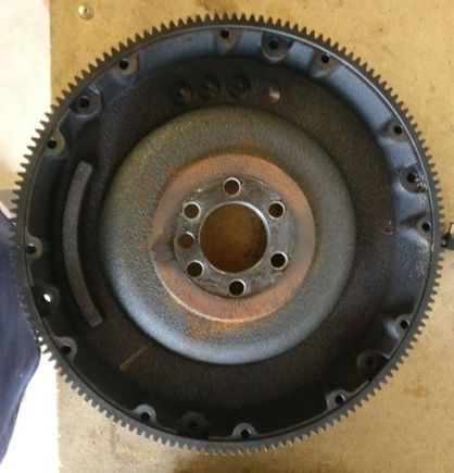 This is the flywheel I installed last Sept. It has the weight at 9 o'clock and also some drilled places at 12 o'clock.