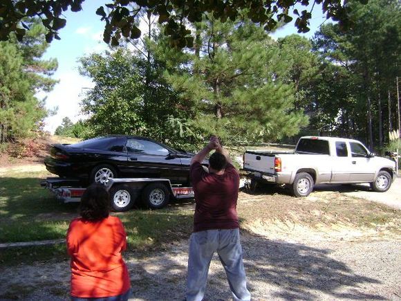 My uncle all happy cause his yards getting cleaned up