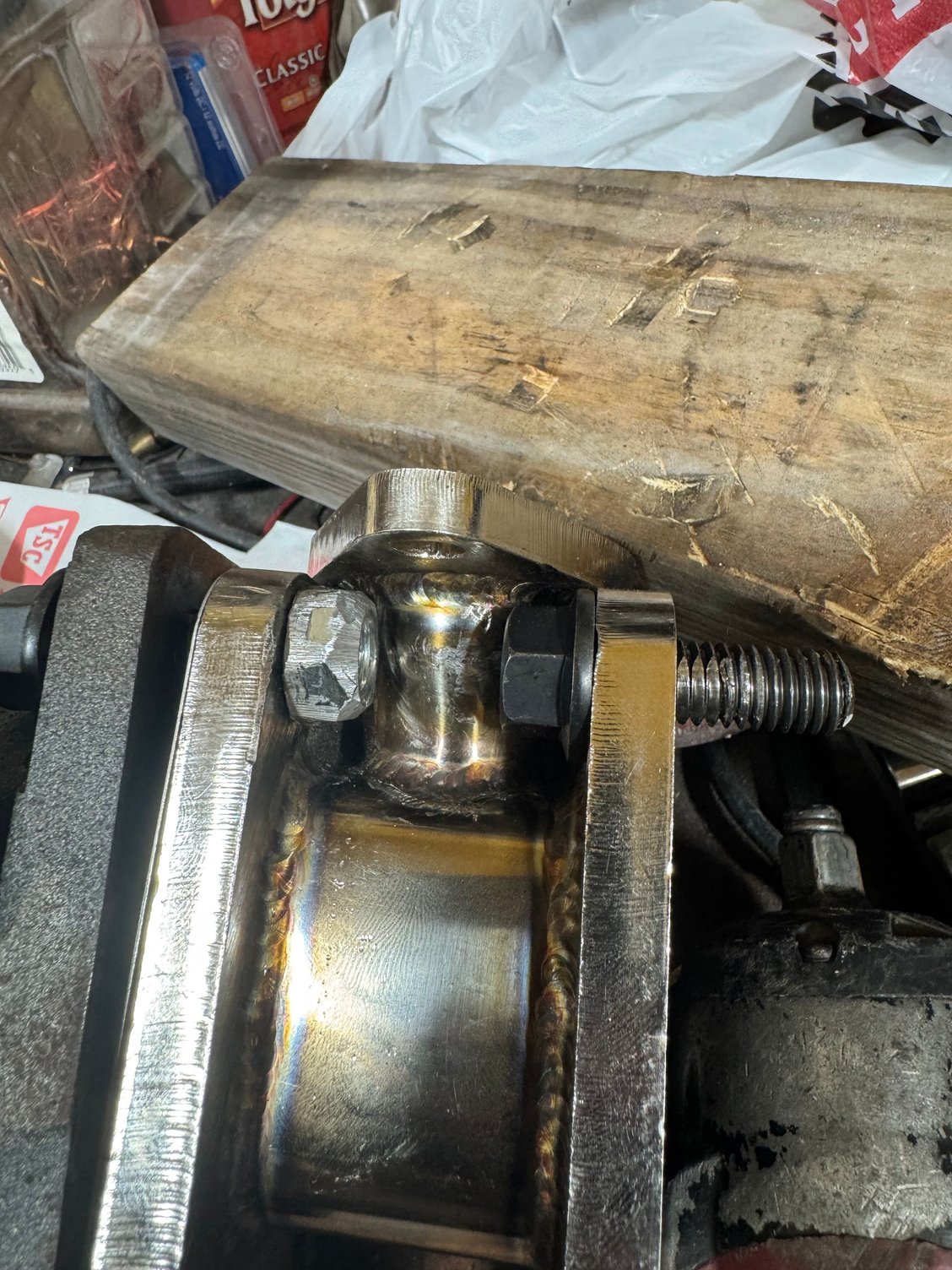 Nuts and bolts cut and ground into position 