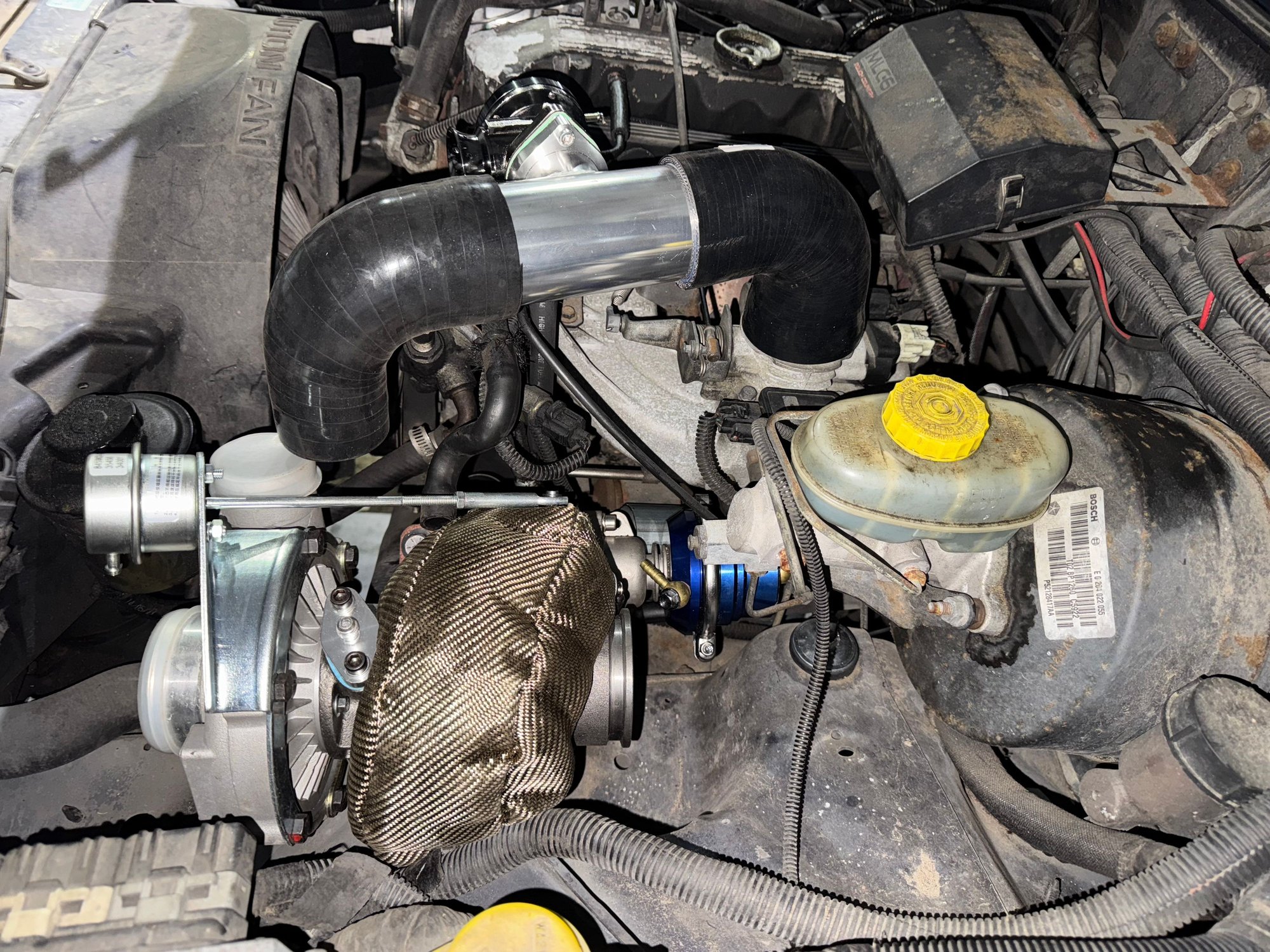 The watergate is hitting the intake manifold. SMH 