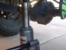 I had jacked it up to relieve some pressure before. After the KB 88, I didn't even need the breaker, just a 10 inch ratchet handle!