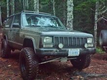 Looks bigger than it is in this pic. Still has 31s, and the 3" lift, and the rear had settled down some to about 4" lift. Had a lot of fun on this trail, leading us to a nice lake to have a fire at.