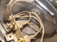 2nd round, these wires melted on driver side, near air cleaner. yellow pieces attach to vacuum lines. not sure what this whole thing is? connects to pigtail that had a red/white wire, potentially same red/white wire as from 1st melted green wire?