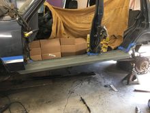 So after a bit of grinding on the welds I wanted to smooth out, I primered the bare metal surfaces.