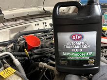 Adding transmission fluid 