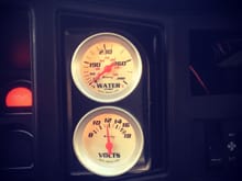 Truck came with idiot lights, so I installed a water temp gauge and a volt meter.