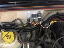 Cleaned up the wiring some. I flex loomed 99% of the wires and remounted the relays and made it simpler.I would like a relay box that is waterproof but this is what it is for now. I also did the fan switch mod.