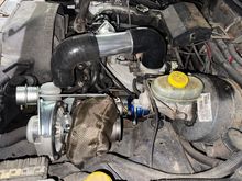 The watergate is hitting the intake manifold. SMH 