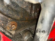 This is at the bottom of the blower motor housing. I tried covering most of this area with black silicone RTV sealant.