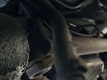 Dangling hose next to oil pan. No idea where it’s suppose to hook up too.  